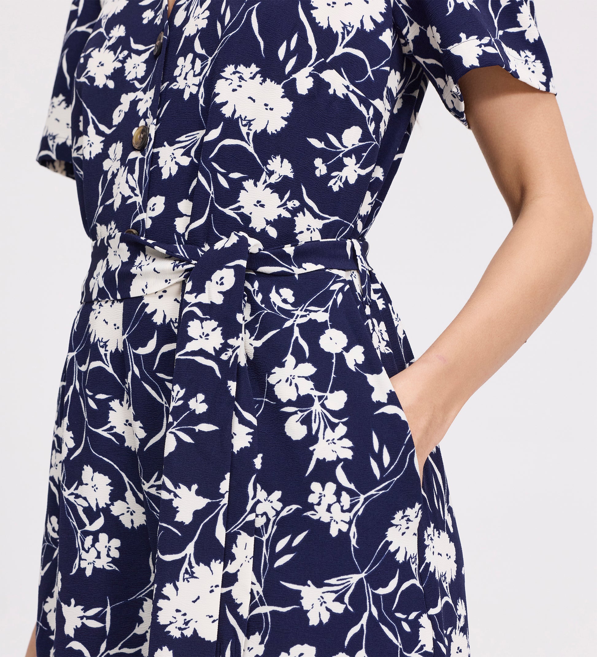 Uma Navy Floral Belted Wide Leg Jumpsuit on a plain background