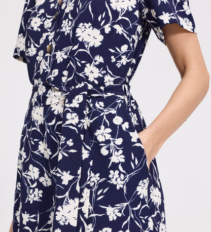 Uma Navy Floral Belted Wide Leg Jumpsuit on a plain background